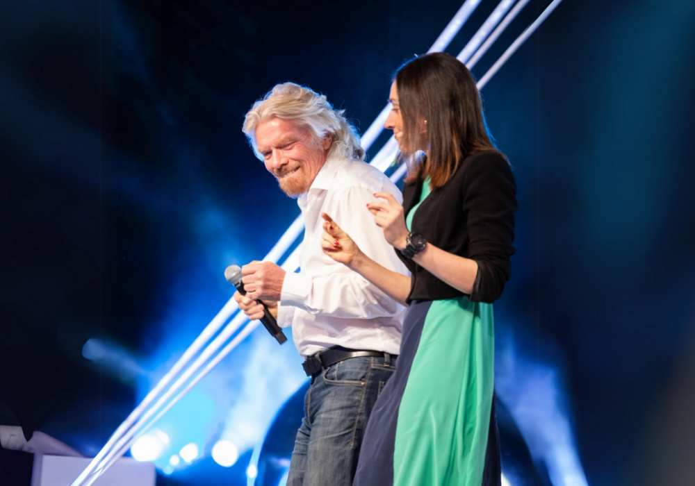 Richard Branson & Holly Ransom dancing onstage