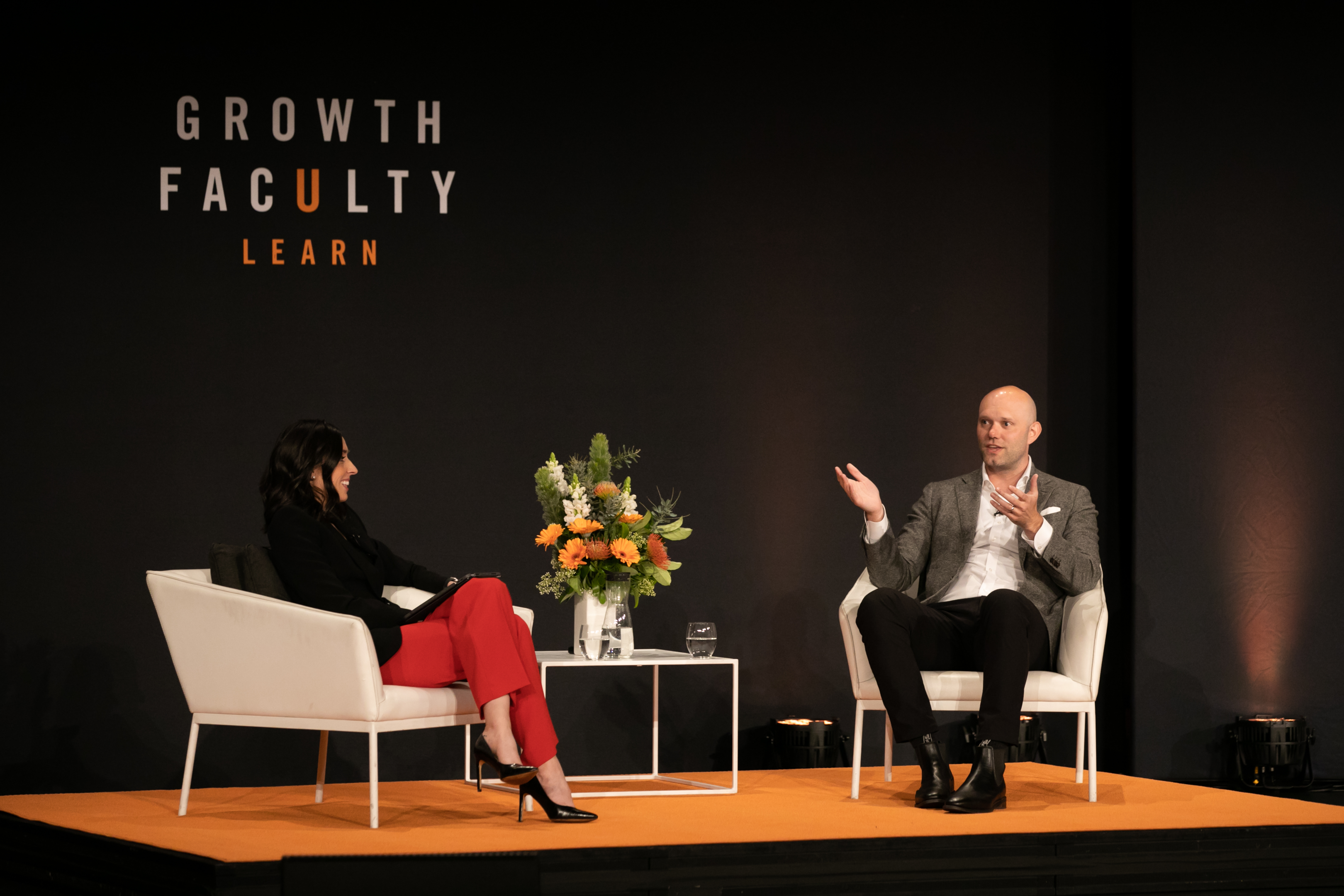 Holly Ransom interviewing James Clear at a recent Growth Faculty event.